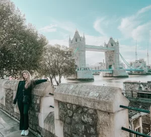 Standing on the road with the London Bridge in the background